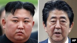 김정은 북한 국무위원장과 아베 신조 일본 총리. 