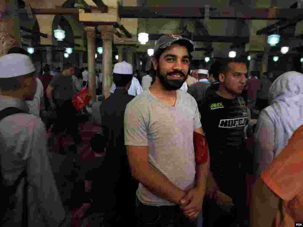 Mohamed Omar 24, a student and carpenter, is seen after Friday’s prayers in Cairo on May 27, 2016. He says “I come here to Al-Azhar for prayers. At Al-Azhar Mosque the speeches and prayers focus more on morals and how to be a good person, which still no