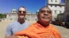 Activist monk Luon Sovath and Chris Kelly in front of the Household Cavalry Museum in London, England. (Courtesy of Luon Sovath)