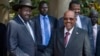 South Sudan's President Salva Kiir, left, meets with Sudan's President Omar al-Bashir, right, in the capital Juba, South Sudan, Jan. 6, 2014.