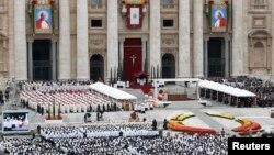 Family members of U.S. Embassy employees look out at the staging area before the start of a flag-raising ceremony, at the newly opened U.S. Embassy, in Havana, Cuba.
