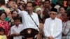 Presiden Joko Widodo didampingi KH Ma'ruf Amin dalam pidato pasca dinyatakan menang dalam Pilpres, di Jakarta Selasa (21/5). 