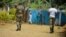 FILE - Soldiers patrol in Bafut, in the northwest English-speaking region of Cameroon, Nov. 15, 2017.