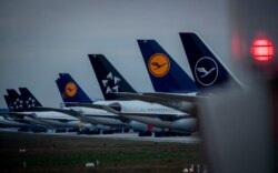 Aircrafts of German Lufthansa airline are parked on a runway at the airport in Frankfurt, Germany, May 4, 2020. Lufthansa is in negotiations with the German government about financial aid.