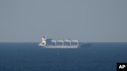 Фото: вантажний корабель Razoni прибув до Туреччини 2 серпня 2022 року (AP Photo/Халіл Хамра)