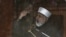 Sufi cleric and leader of the Minhaj-ul-Quran religious organisation Muhammad Tahirul Qadri addresses his supporters from behind the window of an armored vehicle on the second day of protests in Islamabad, January 15, 2013.