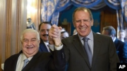 عکس آرشیوی از دیدار سرگئی لاوروف وزیر خارجه روسیه (راست) با ولید معلم همتای سوری خود در مسکو - دی ماه ۱۳۹۳ 