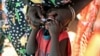 FILE - A displaced South Sudanese child receives an oral cholera vaccine in a camp for internally displaced people in the United Nations Mission in South Sudan compound in Tomping, Juba, Feb. 2014.