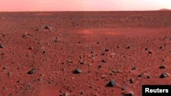 FILE - This image taken by the Mars Exploration Rover Spirit's camera shows the Martian surface southwest of the rover's landing site. (REUTERS/NASA/JPL/Arizona State University/Cornell University/Handout)