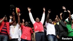 Uhuru Kenyatta na William Ruto wakiwa katika kampeni