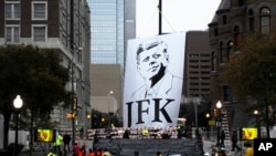 Mourners gather during the burial ceremony in Jerusalem for the victims of attack on a Paris grocery. The bodies of four French Jews killed in an attack on a Paris kosher grocery have been flown to Israel for burial.