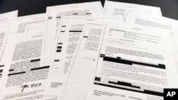 美国司法部星期四将前联调局长科米写的备忘录交给国会