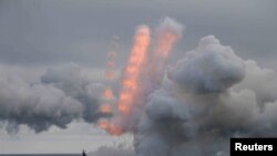 کەشتییەکی هێزی دەریایی ڕووسیا لە میانەی مەشقێکی سەربازیی هاوبەشدا لە نێوان کەشتیگەلی باکوور و دەریای ڕەشی ڕووسیادا لە کەناری کرایمیا