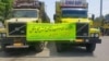 Idled trucks in northern Iran’s Rasht city display a sign urging truck drivers to keep up their struggle for better working conditions, in this photo sent to VOA Persian by an audience member and dated May 24, 2018. The license plates have been mostly covered to prevent their identification by Iranian authorities.