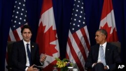 باراک اوباما و جاستین ترودو نخست وزیر جدید کانادا در حاشیه نشست فیلیپین