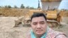 Sok Oudom, pictured at a construction site, is the owner of Rithysen radio station and a local citizen journalist in Kampong Chhnang province, Cambodia. (Courtesy of Facebook)