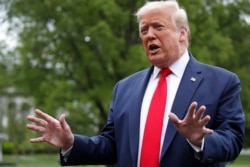FILE - President Donald Trump speaks with reporters on the South Lawn of the White House, May 14, 2020, in Washington.