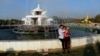 A couple takes a self-portrait at People&#39;s Square on Valentine&#39;s Day near Shwedagon pagoda in Rangoon, Feb. 14 , 2014. 