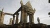 FILE - A Cambodian temple security guard stands at Preah Vihear temple, Cambodia, July 18, 2012.