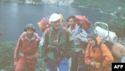 Undated handout picture released on Feb. 28, 2025, by Vieiro family and Rabal family of the late legendary mountaineer Guillermo Vieiro (2nd L) along with other climbers. 