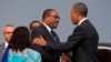 President Barack Obama, right, shakes hands with Ethiopian Prime Minister Hailemariam Desalegna after arriving at Addis Ababa Bole International Airport, on Sunday, July 26, 2015, in Addis Ababa. 