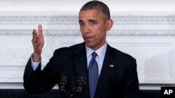 A fragment of the artwork 'Honour' from the series 'Five Elements of War', created by Ukrainian artists Daniel Green and Daria Marchenko, is on display at a studio in Kyiv. The artwork is made of bullet and shell cartridges from the frontline of a military conflict in eastern Ukraine, along with shoulder straps and other military items.