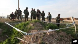 یک گور دسته‌جمعی ایزدیان.