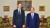 In this photo provided by Egypt's state news agency, MENA, Egypt's President Abdel-Fattah el-Sissi, right, poses for a photo with White House adviser Jared Kushner, in Cairo, Egypt, Wednesday, Aug. 23, 2017. 