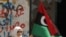 Libyans Mark Holiday by Touring Gadhafi's Former Compound