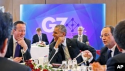 6月5日美国总统奥巴马和英国首相卡梅伦（左）在布鲁塞尔参加七国会议