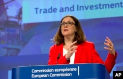 FILE - European Commissioner for Trade Cecilia Malmstrom speaks during a media conference at EU headquarters in Brussels, June 26, 2018.
