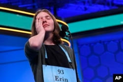Erin Howard, 14, of Huntsville, Ala., reacts as she prepares to spell her final word as she competes in the finals of the 2019 Scripps National Spelling Bee in Oxon Hill, Md., Thursday, May 30, 2019.
