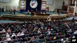 Người đưa tang đến dự một buổi lễ mai táng ở Jerusalem dành cho những nạn nhân thiệt mạng trong cuộc tấn công nhắm vào một siêu thị Do Thái ở Paris. Thi thể của bốn người Pháp gốc Do Thái được đưa tới Israel để chôn cất.