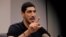 Turkish NBA player Enes Kanter talks with reporters at National Basketball Players Association headquarters in New York, May 22, 2017. 