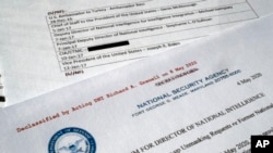 A declassified document with names of President Barack Obama administration officials who made requests for unmasking of Michael Flynn's name is photographed May 13, 2020. 