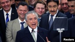 میشل تمر، ۷۵ ساله، معاون اول خانم روسف بود. 