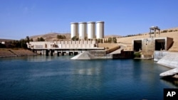 FILE - A general view of the dam in Mosul, 360 kilometers (225 miles) northwest of Baghdad, Iraq. 