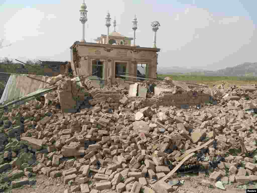 A damaged mosque is seen at the site of a bomb attack in the Spin Tal region of Hangu district, Pakistan, Oct. 3, 2013. 