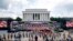 Two Bradley Fighting Vehicles flank the stage being prepared in front of the Lincoln Memorial, Wednesday, July 3, 2019, in Washington, ahead of planned Fourth of July festivities with President Donald Trump. 