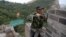 People work on the reconstruction of the Jiankou section of the Great Wall, in Huairou District, north of Beijing, China, June 7, 2017. 