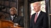 President Joe Biden waits to speak next to South Carolina Democratic Representative Jim Clyburn at a campaign event at Mother Emanuel church in Charleston, South Carolina, on Jan. 8, 2024.