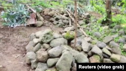 ጭና- መቓብር እቶም በቲ መጥቓዕቲ ተቐቲሎም ዝተባህሉ -
(ምስሊ ሮይተርስ 