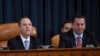 Mwenyekiti wa Kamati ya Upelelezi Adam Schiff wa California, kushoto, akizungumza wakati Mwakilishi&nbsp; Devin Nunes, Mrepublikan-Calif., mjumbe wa ngazi ya juu wa kamati hiyo akisikiliza mahojiano yakiendelea katika Bunge la Marekani, Washington, Jumatano, Nov. 13, 2019