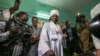 President Omar al-Bashir casts his ballot as he runs for another term, on the first day of the presidential and legislative elections, in Khartoum, Sudan, April 13, 2015. 