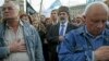 File - Crimean Tatars attend a rally marking the 71st anniversary of their mass deportation from the peninsula to distant parts of the Soviet Union, in Kyiv, Ukraine, May 2015.