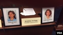 عکس دو بهایی زندانی در ایران در نشست کمیسیون آزادی مذهبی