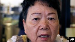 Eiko Kawasaki, a Korean born in Japan, speaks during an interview in Tokyo, Aug. 24, 2018.