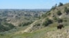 A bison grazes in the North Dakota badlands of Theodore Roosevelt National Park.