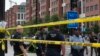 Police work the scene on M Street, SE in Washington near the Washington Navy Yard on Monday, Sept. 16, 2013. 
