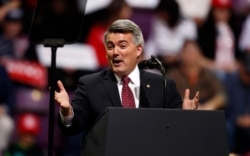 FILE - Sen. Cory Gardner, R-Colo., speaks before an appearance by President Donald Trump at a campaign rally, Feb. 20, 2020, in Colorado Springs, Colo.